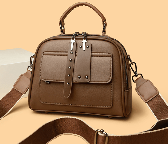 Brown bag with yellow hardware